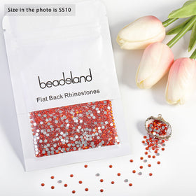 Craft project using BEADSLAND orange rhinestones on a phone case