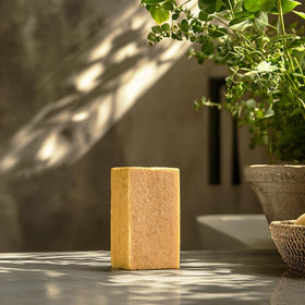 Crate 61 Organics Mango scented soap in a natural setting