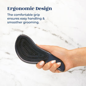 Crave Naturals Glide Thru Hair Brush with a child using it