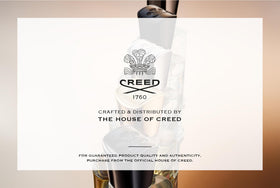Creed Viking Men's Cologne on a wooden table