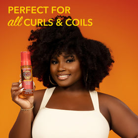 Creme of Nature mousse application on curly hair
