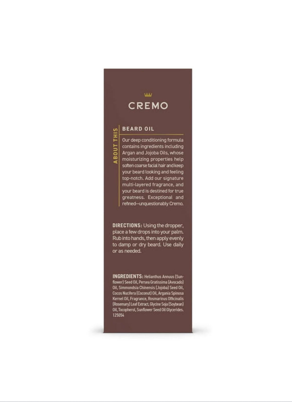 Cremo Beard Oil 1 fl oz packaging on a wooden surface