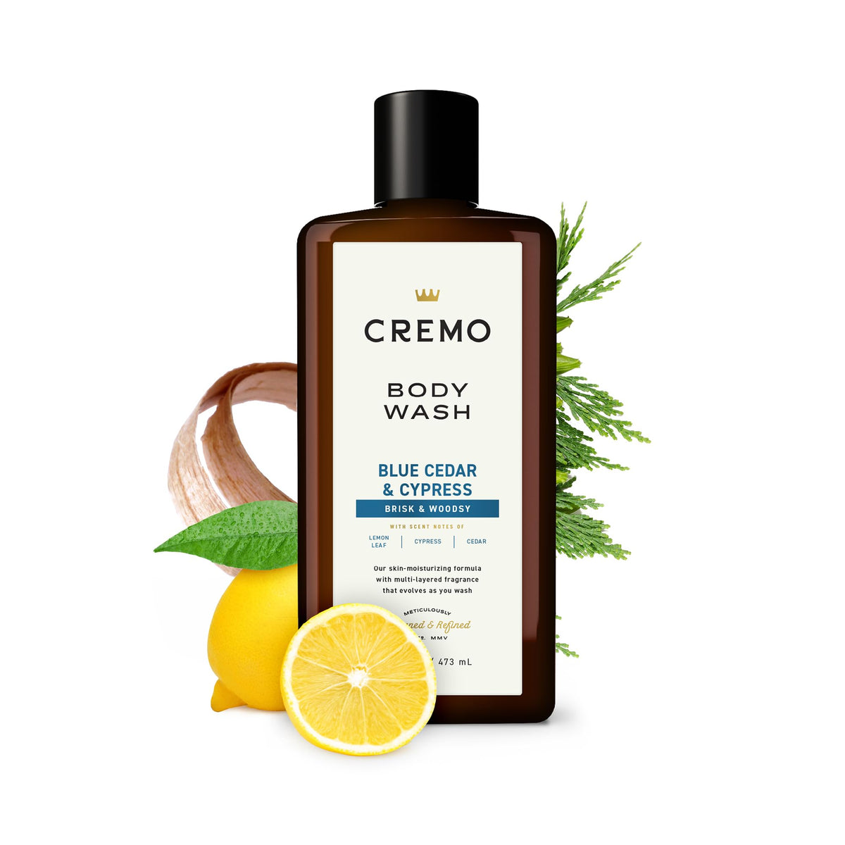 Cremo Blue Cedar & Cypress Body Wash with fresh cedar and cypress leaves