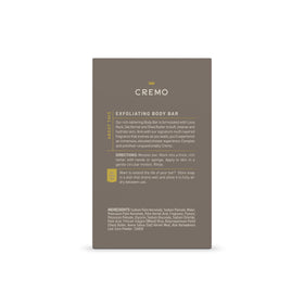 Cremo Exfoliating Body Bar for Men in a shower setting