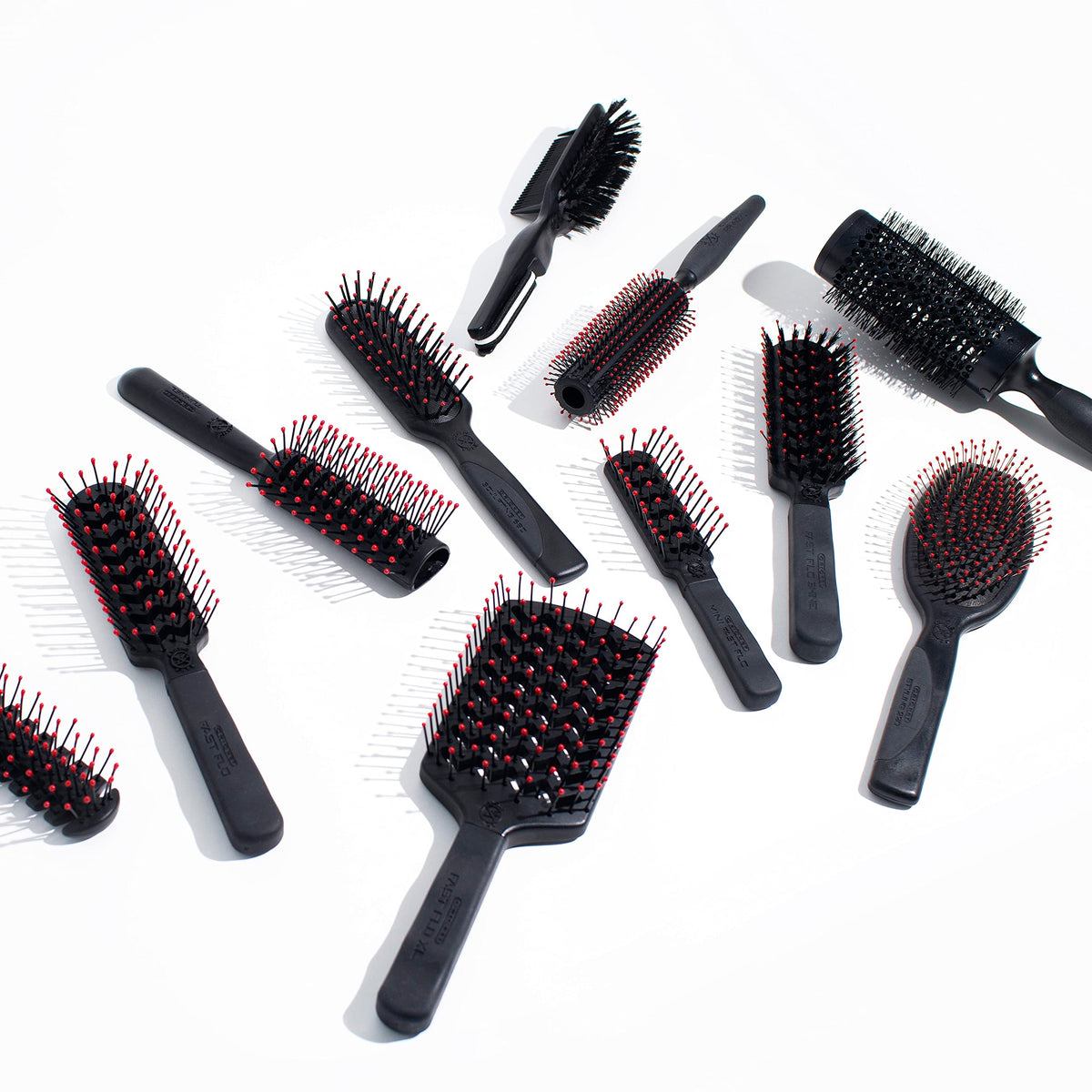Cricket Mini Fast Flo Vent Hair Brush on a bathroom counter