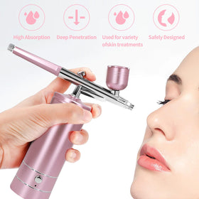crpen Airbrush Kit in use for nail art application