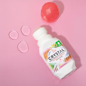 Crystal Essence Coconut Vanilla Deodorant Roll-On application on skin