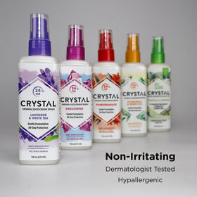 Crystal Essence Deodorant Spray 4 fl oz on a bathroom counter