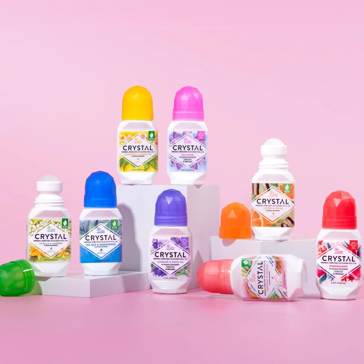 Crystal Essence Mineral Deodorant Roll-On group shot with three bottles
