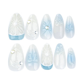 CTTHNBD Almond Press On Nails displayed on a hand