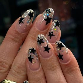 CTTHNBD Press on Nails Almond black star design front view