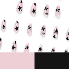 CTTHNBD Press on Nails Almond close-up of black star design