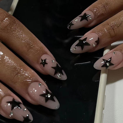 CTTHNBD Press on Nails Almond medium black star design front view