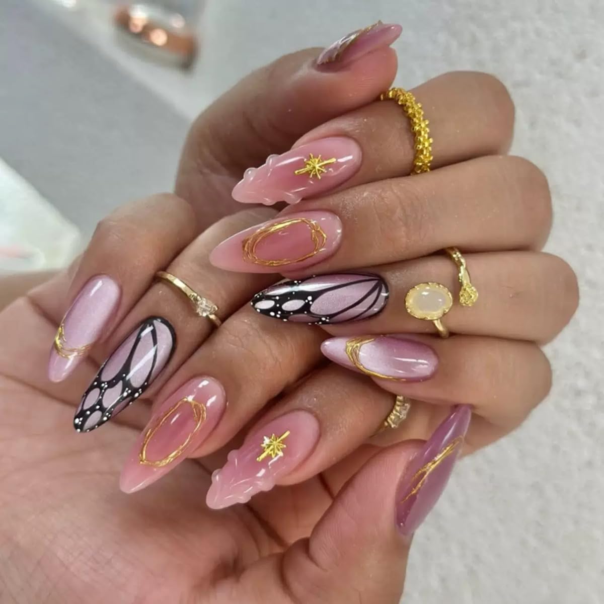 CTTHNBD Press on Nails Almond with butterfly design front view