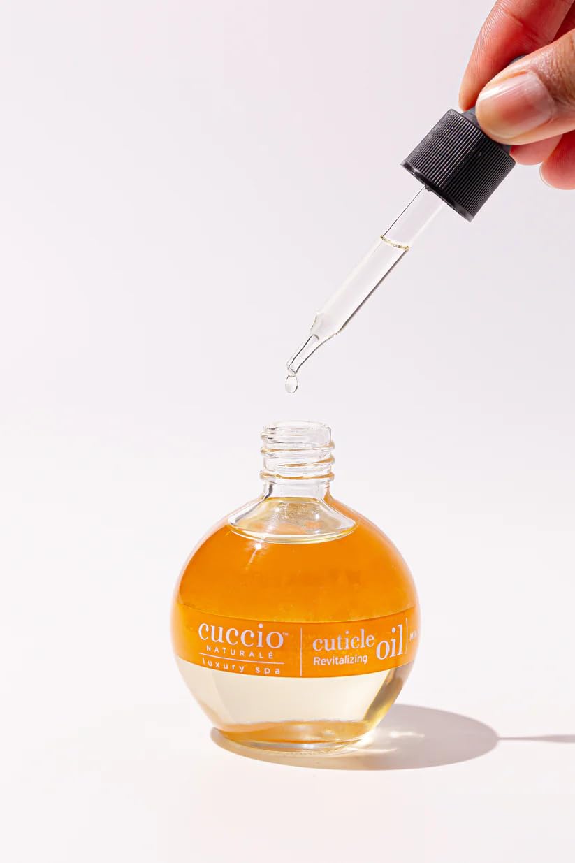 Cuccio Milk & Honey Cuticle Oil packaging display