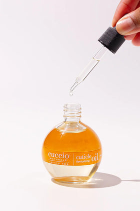 Cuccio Milk & Honey Cuticle Oil packaging display