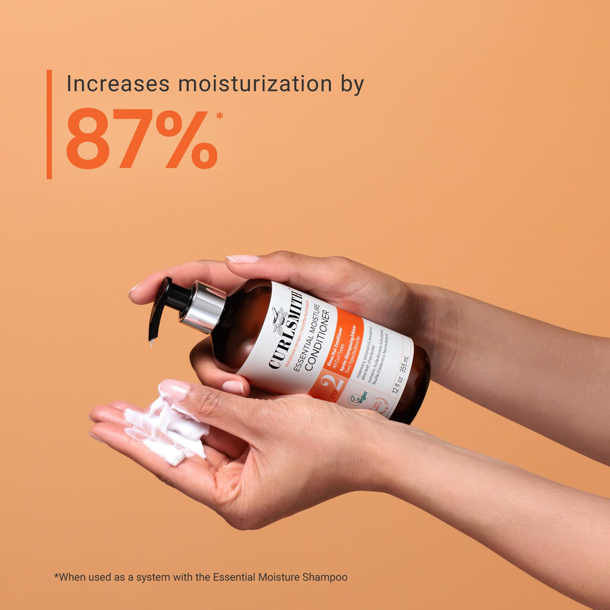 CURLSMITH Essential Moisture Hydrating Conditioner in a bathroom setting with curly hair products