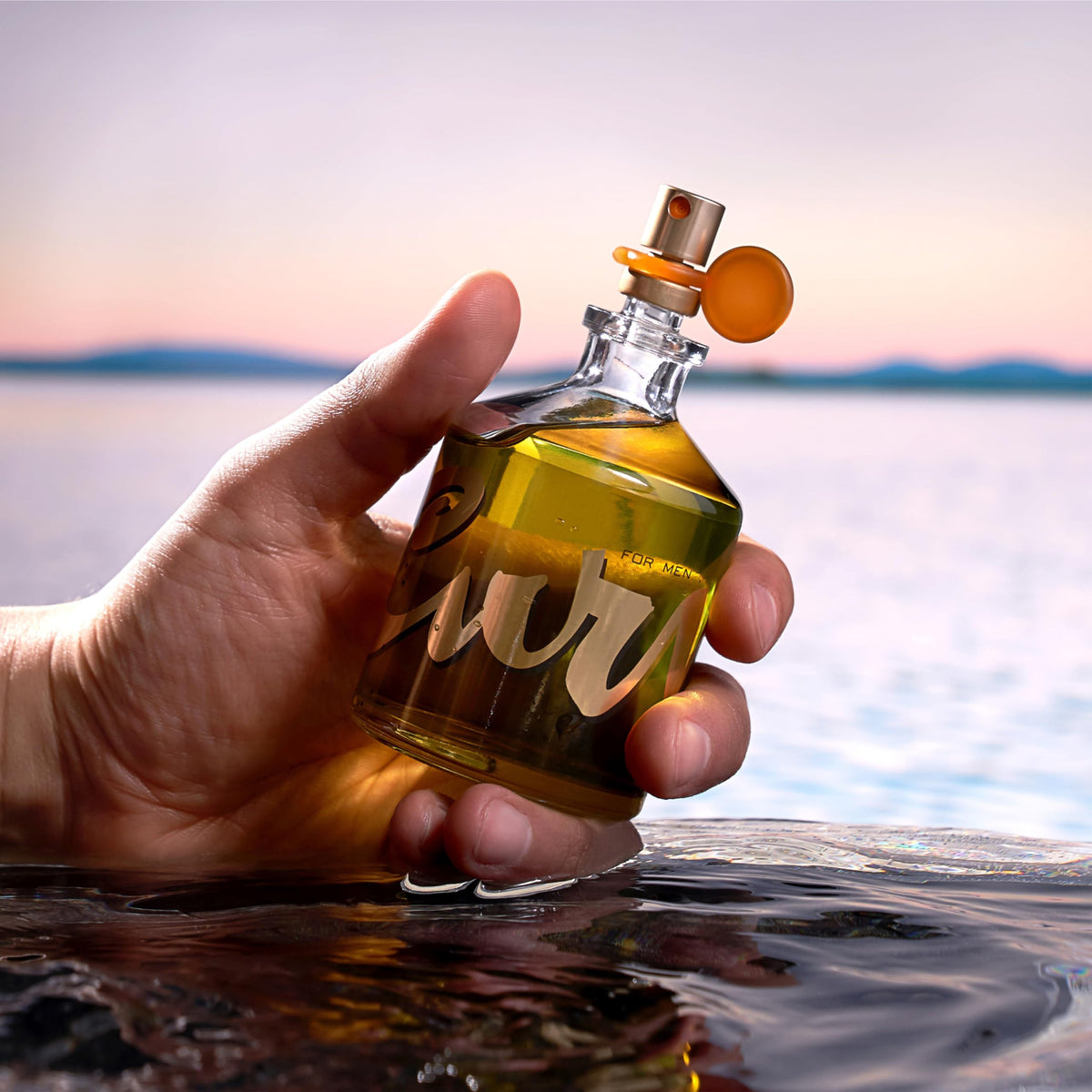 Curve Men's Cologne bottle with natural elements