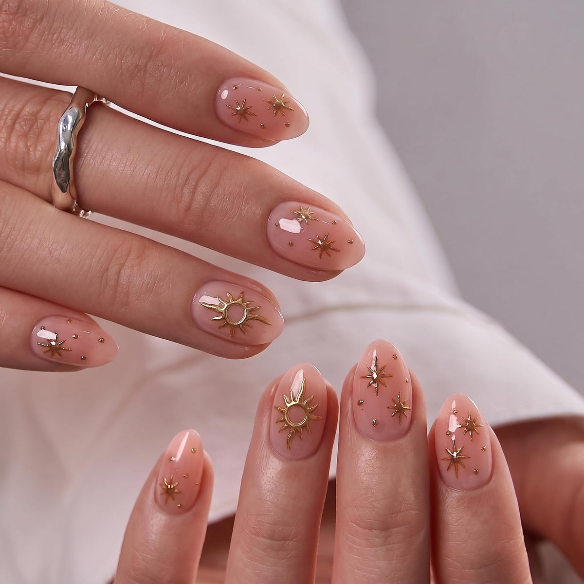 CurvLife Extra Short Almond Cat Eye Press On Nails displayed with nail file and cuticle stick