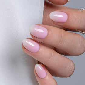 CurvLife Extra Short Almond Ombre Press On Nails front view with silk fade nude pink