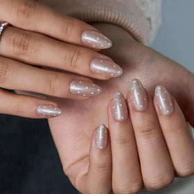 CurvLife Extra Short Almond Press On Nails displayed on a hand