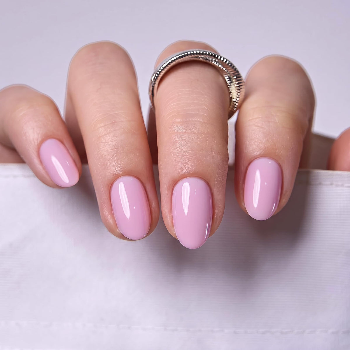 CurvLife Extra Short Almond Press On Nails in packaging