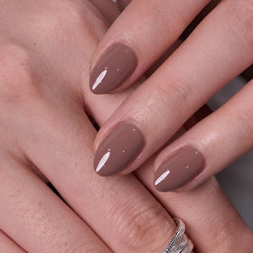CurvLife Extra Short Almond Press On Nails Mocha Muse with nail glue and accessories