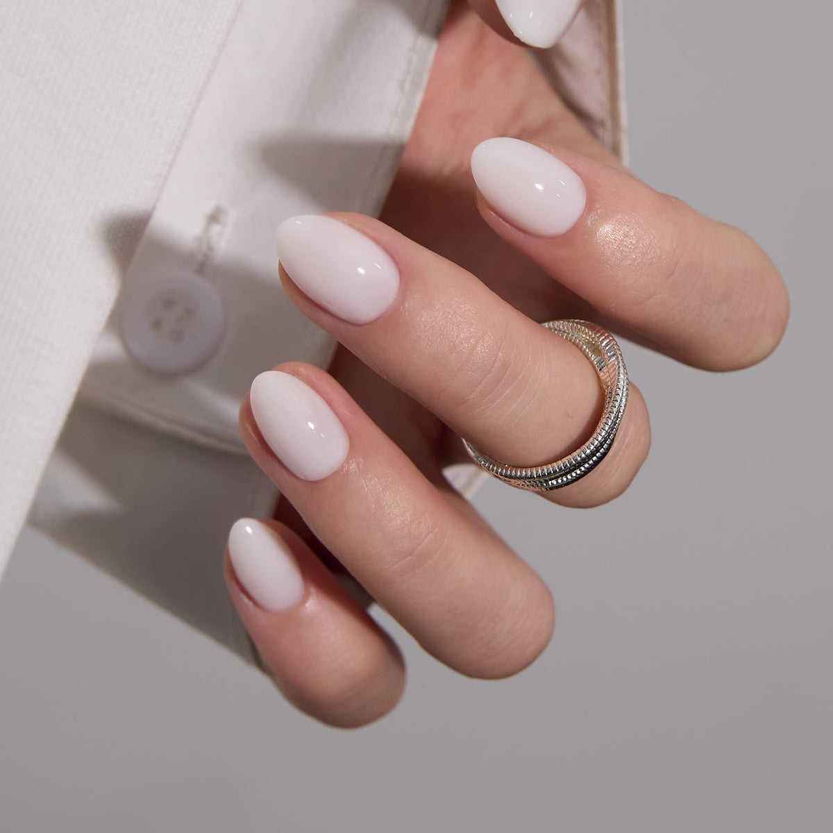 CurvLife Extra Short Almond Press On Nails packaging with contents displayed