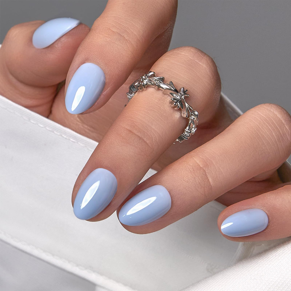 CurvLife Extra Short Almond Press On Nails Terra Nude Blue front view