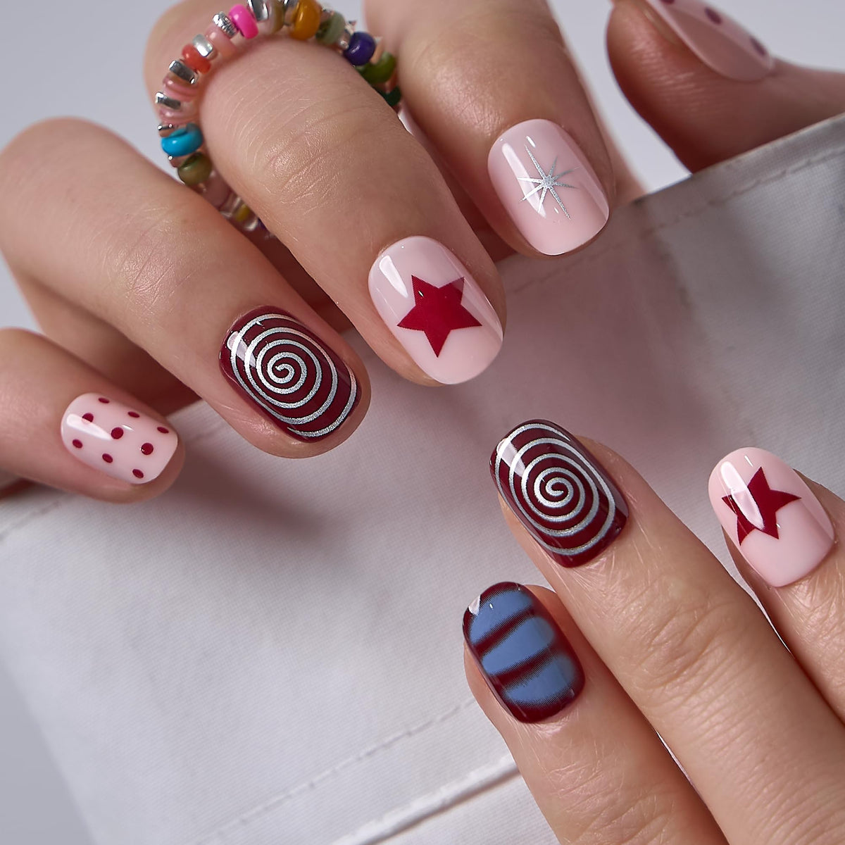 CurvLife Extra Short Square Press On Nails Crimson Swirl front view