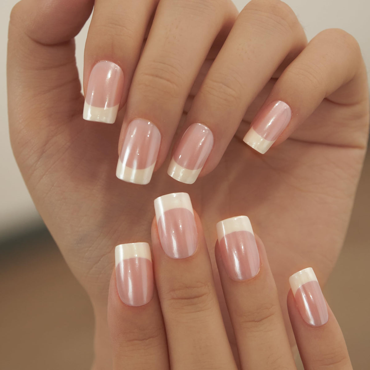 CurvLife press on nails in a hand with a natural look