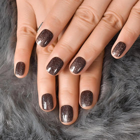 CurvLife Short Square Cat Eye Glitter Press On Nails applied on fingers