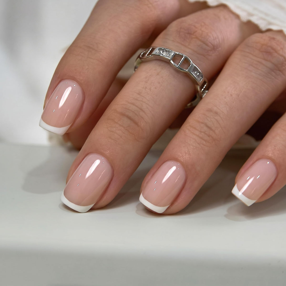 CurvLife Short Square French Tip Press On Nails in packaging