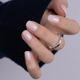 CurvLife Short Square Press On Nails displayed with a nail file and glue stickers