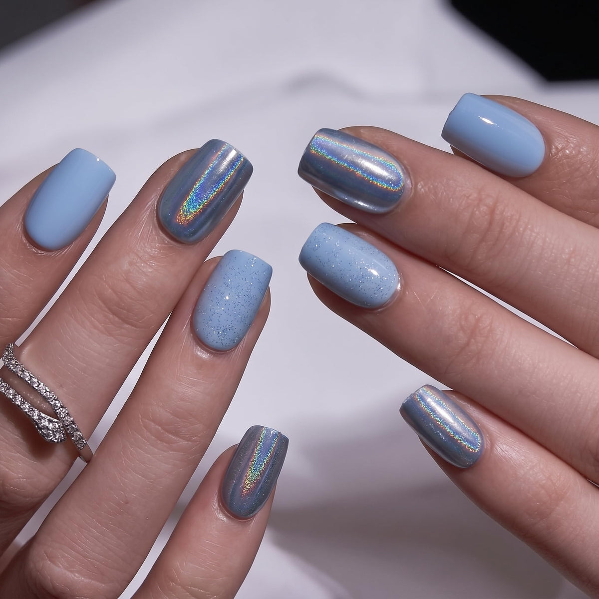 CurvLife Short Square Press On Nails displayed with nail glue and adhesive tabs