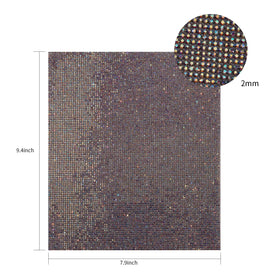 Cut pieces of HANWER rhinestone sheets applied on a phone