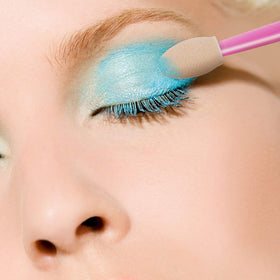 Cuttte eye shadow applicators in use for face painting