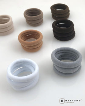 Cyndibands No Damage Hair Ties held in hand for size reference