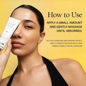 d'alba Piedmont Vita Toning Capsule Cream 82g tube with a small amount on a fingertip