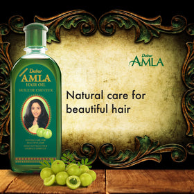 Dabur Amla Hair Oil 500ml pouring into hand