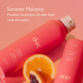DAE Sunsetter Hairspray being sprayed on styled hair
