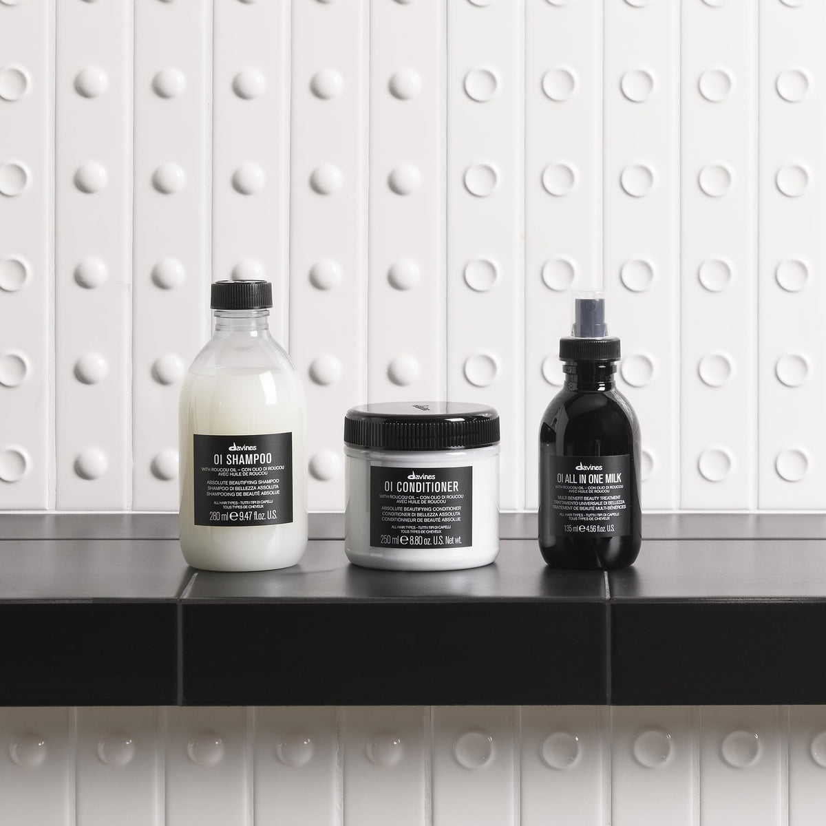 Davines OI Shampoo 549g refill in bathroom setting