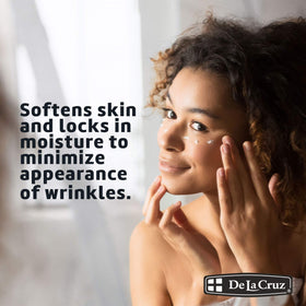 De La Cruz Vitamin E Cream Moisturiser displayed with avocado and shea butter