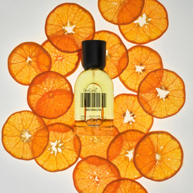 DedCool Red Dakota Eau de Parfum 15 mL on a vanity