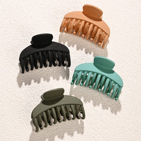 DEEKA Hair Claw Clip demonstrating grip on thin hair