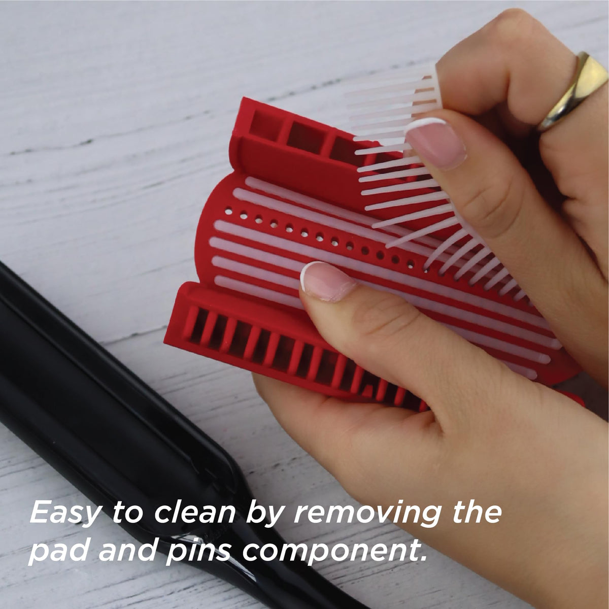 Denman Curly Hair Brush D3 on a styling table