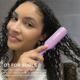 Denman Curly Hair Brush D3 with a close-up of the tear-drop handle