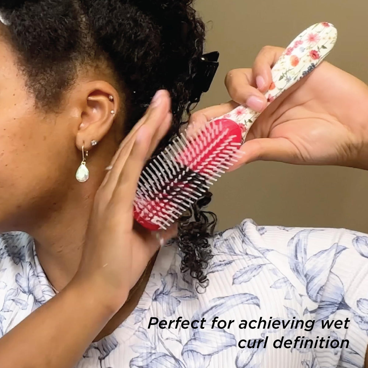 Denman D3 Curly Hair Brush being used on curly hair