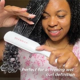 Denman D3 Curly Hair Brush Cherry Blossom on a styling table