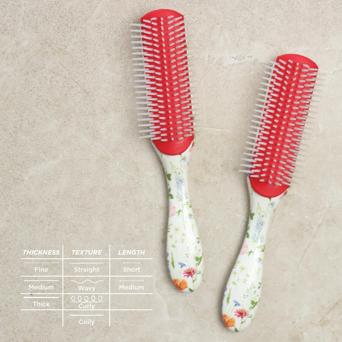 Denman D3 Curly Hair Brush displayed with hair care products
